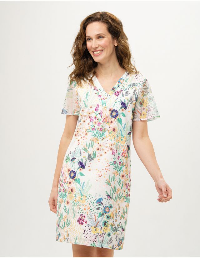 Robe chic blanche motifs